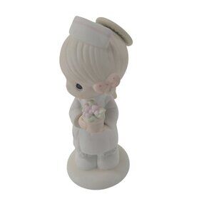 precious moments angel of mercy figurine